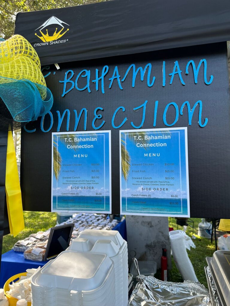 A sign that says bahamian connection and is written in blue.